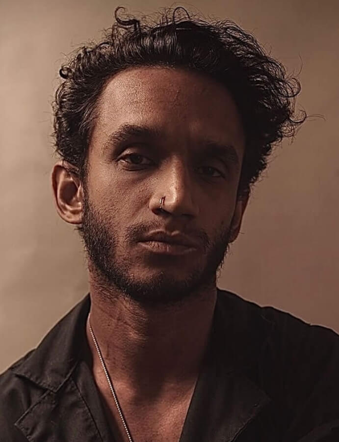 Headshot of Milan Daemgen
