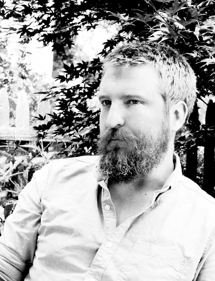 A promotional head shot of the artist Ryan Alexander MacDonald